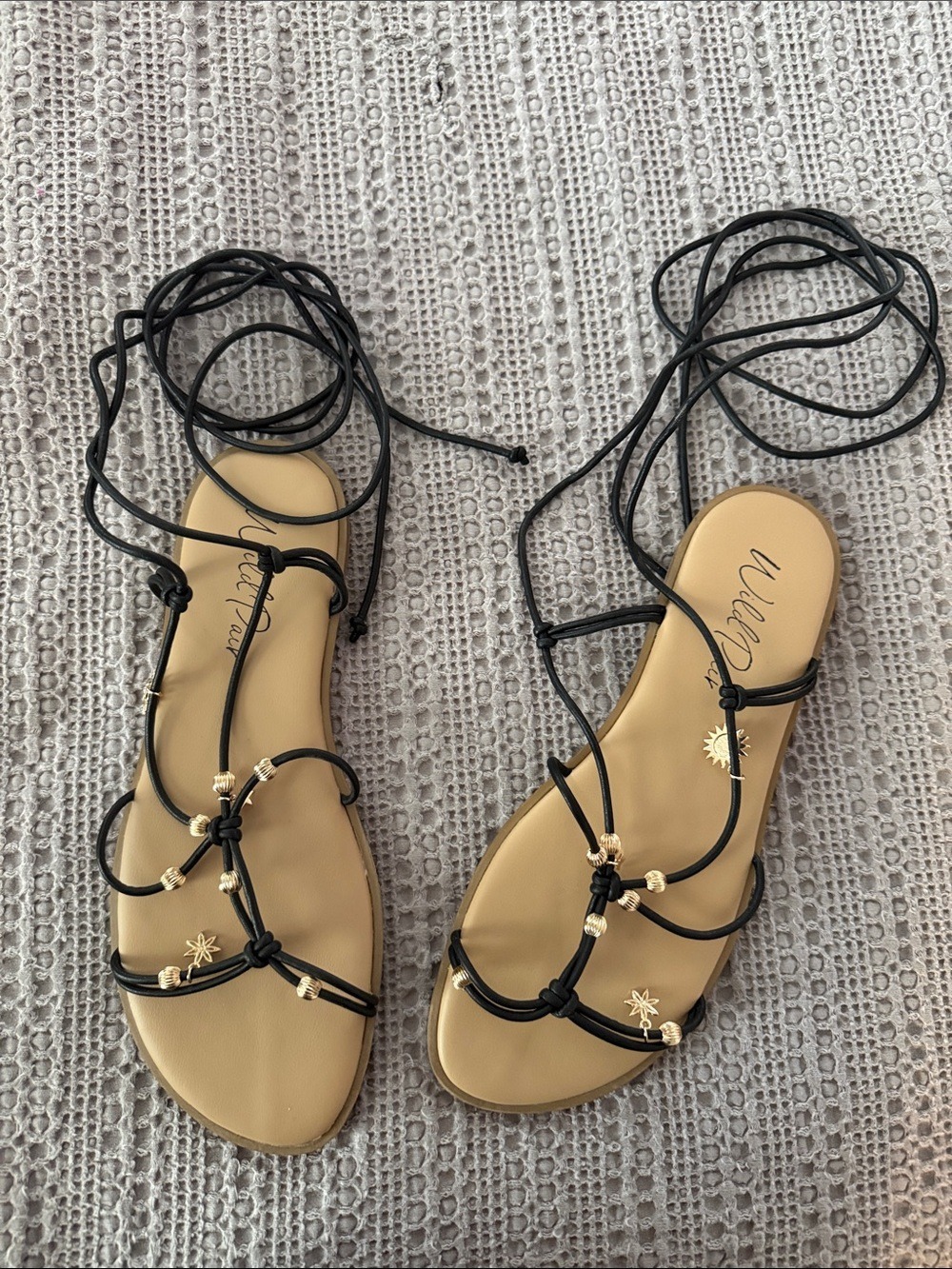 Wild Pair Black Lace-Up Sandals with Gold Accents